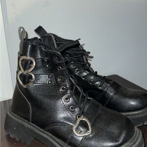 Stylish Black Combat Boots with Heart Accents